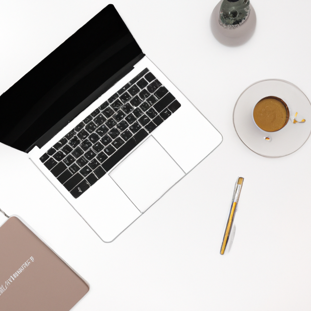 Modern minimalist workspace with laptop, notebook, and coffee in soft light